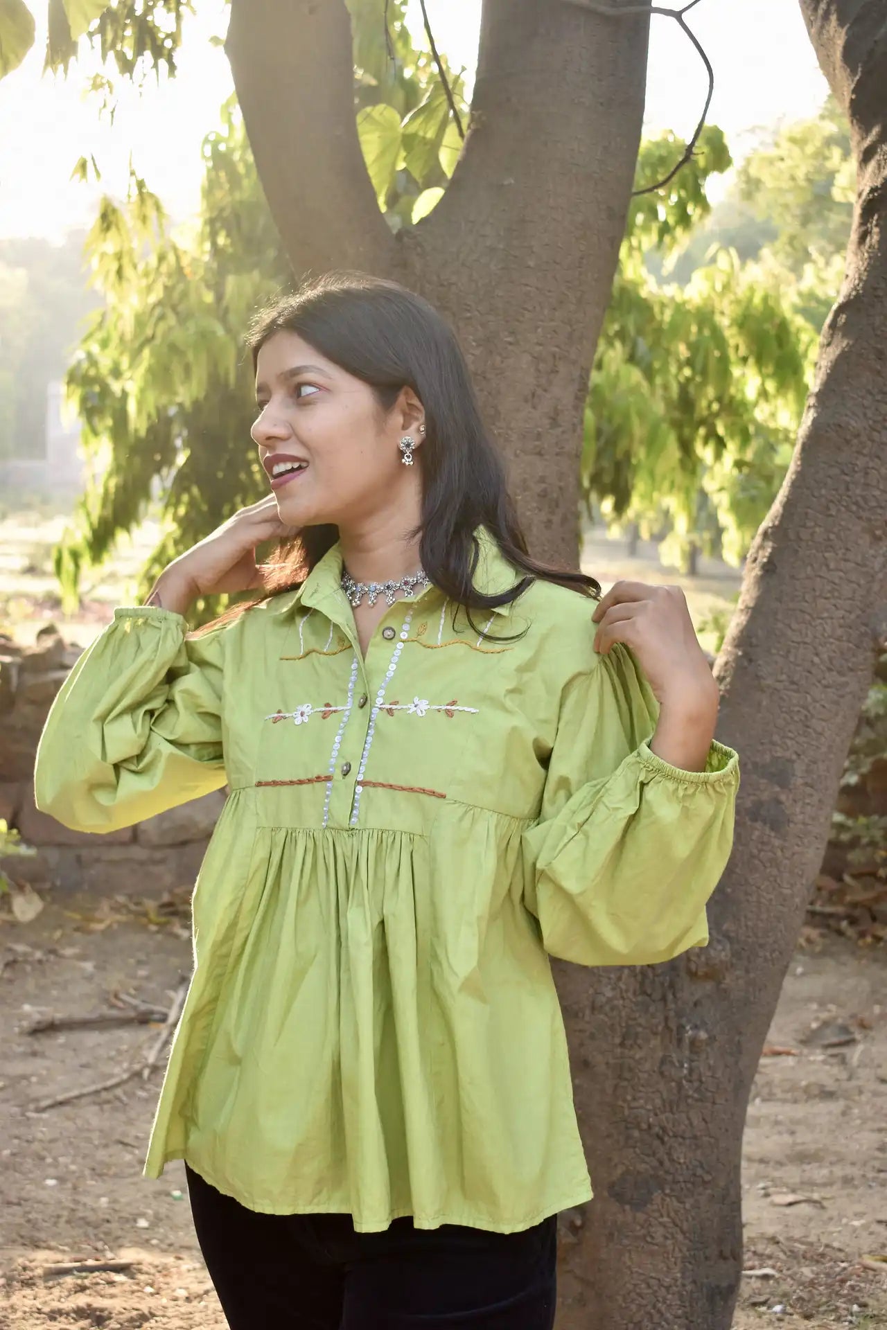 Diva Daulti pistachio green cotton top with floral details