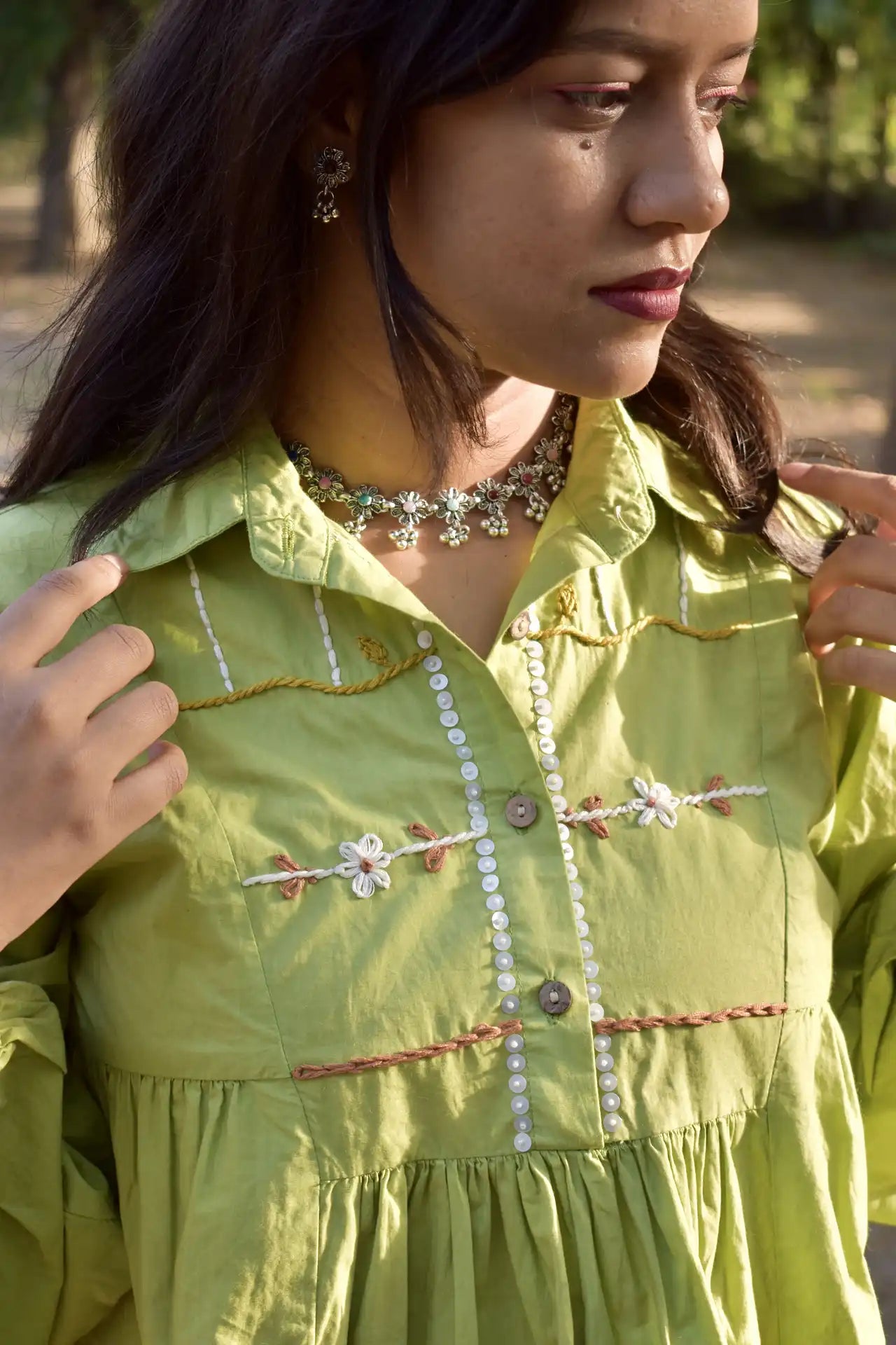Diva Daulti pistachio green cotton top with floral details